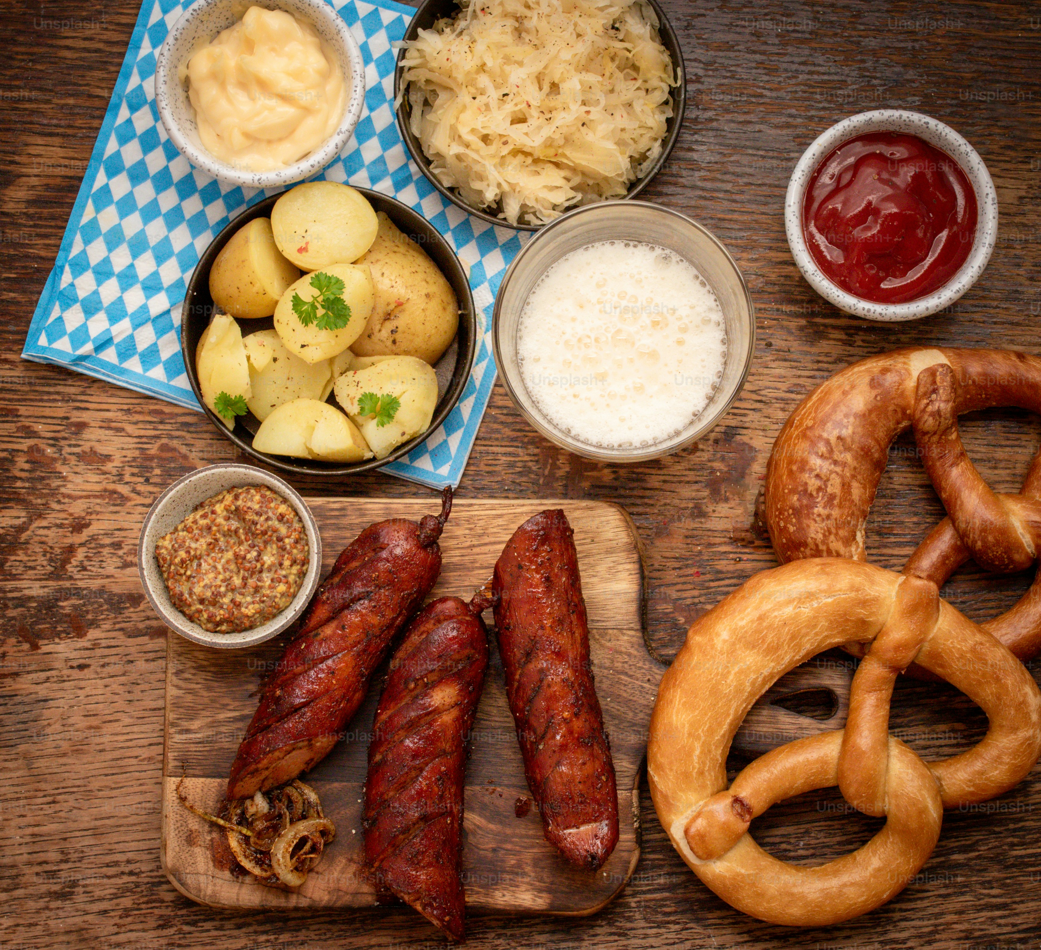 a wooden table topped with different types of food