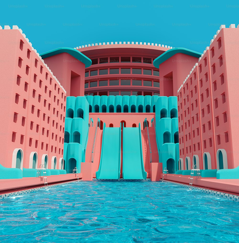 a large pink building with a pool in front of it