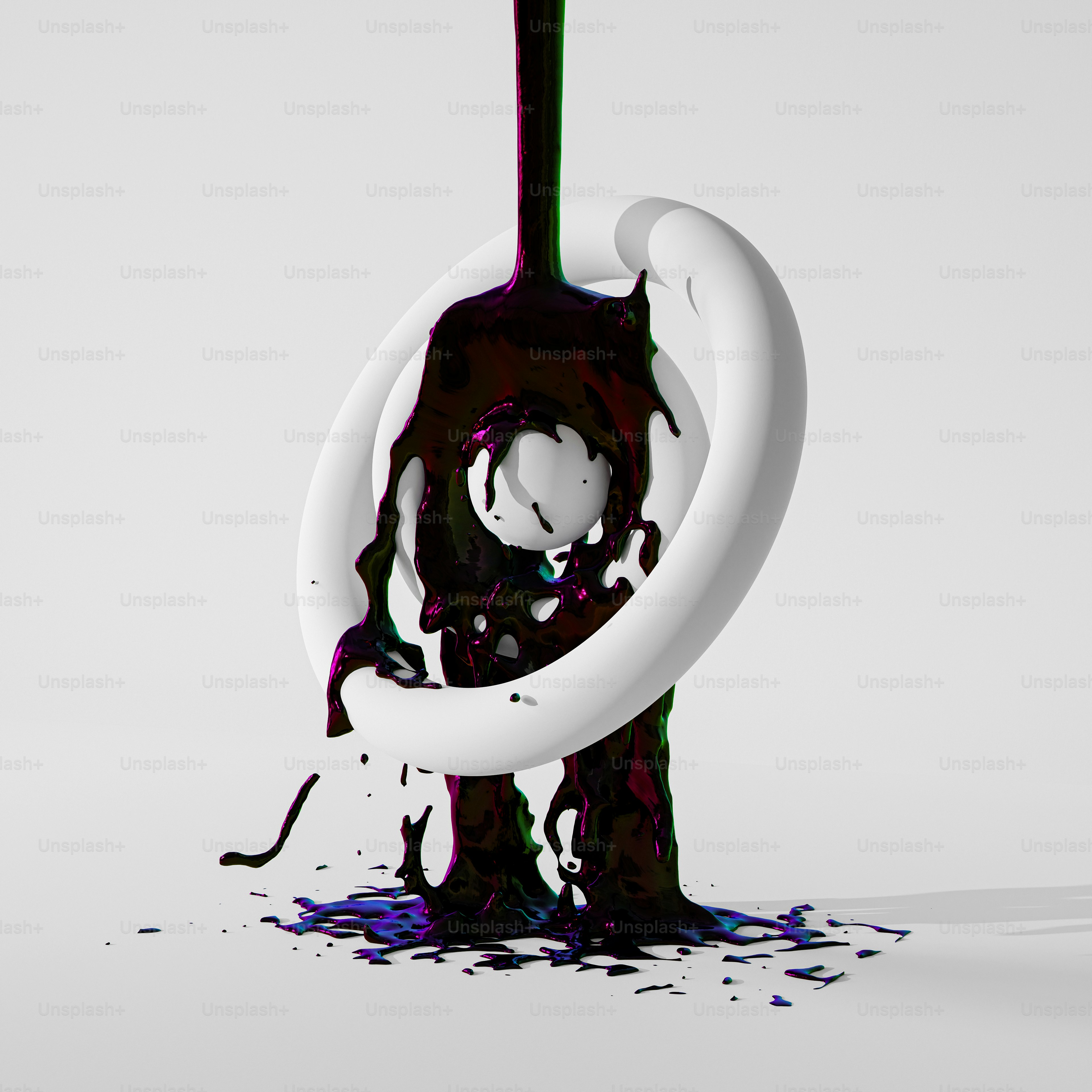 a liquid pouring out of a black and white vase
