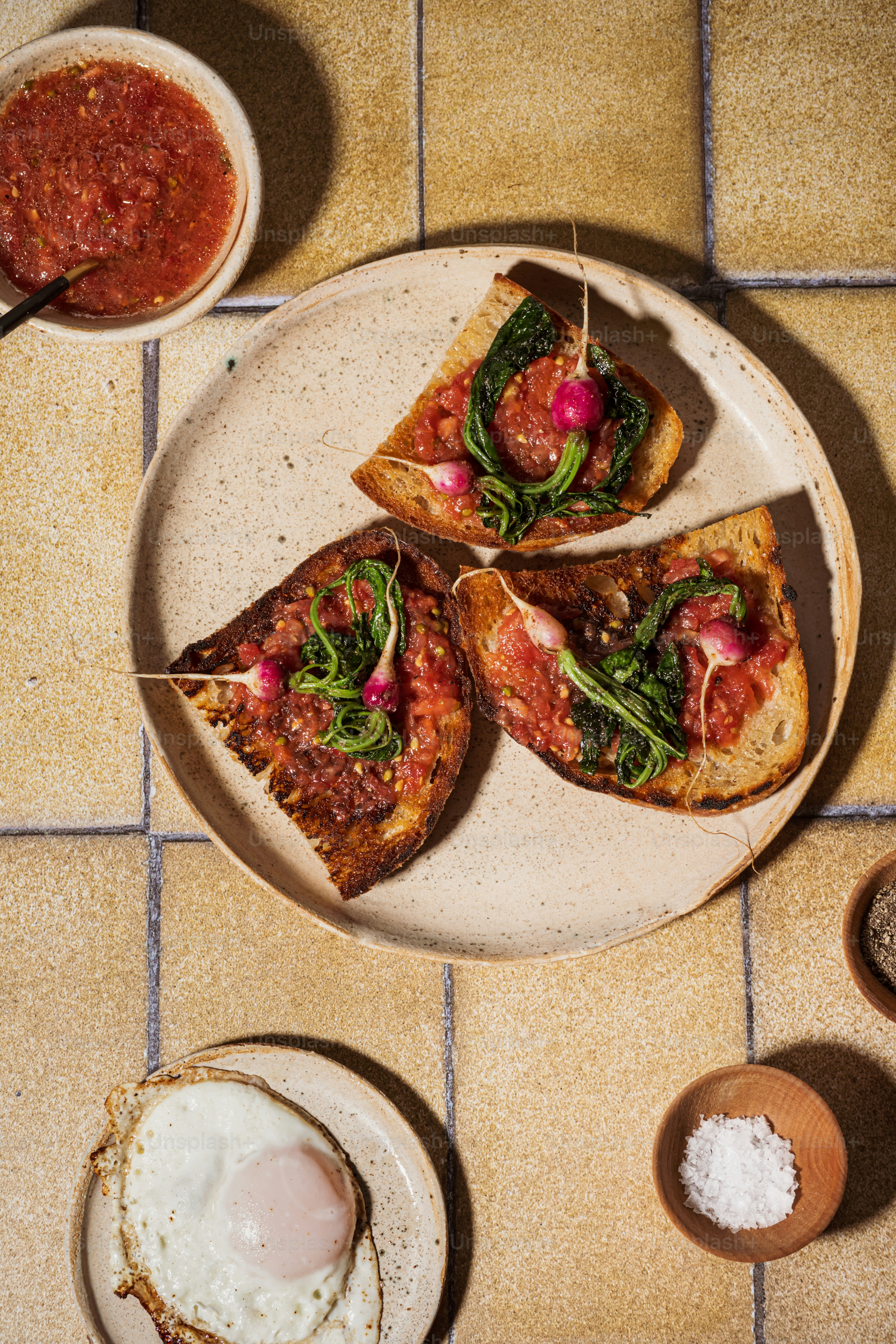 a white plate topped with three pieces of pizza