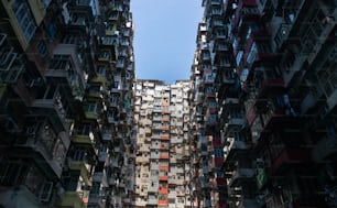 a very tall building with lots of windows and balconies