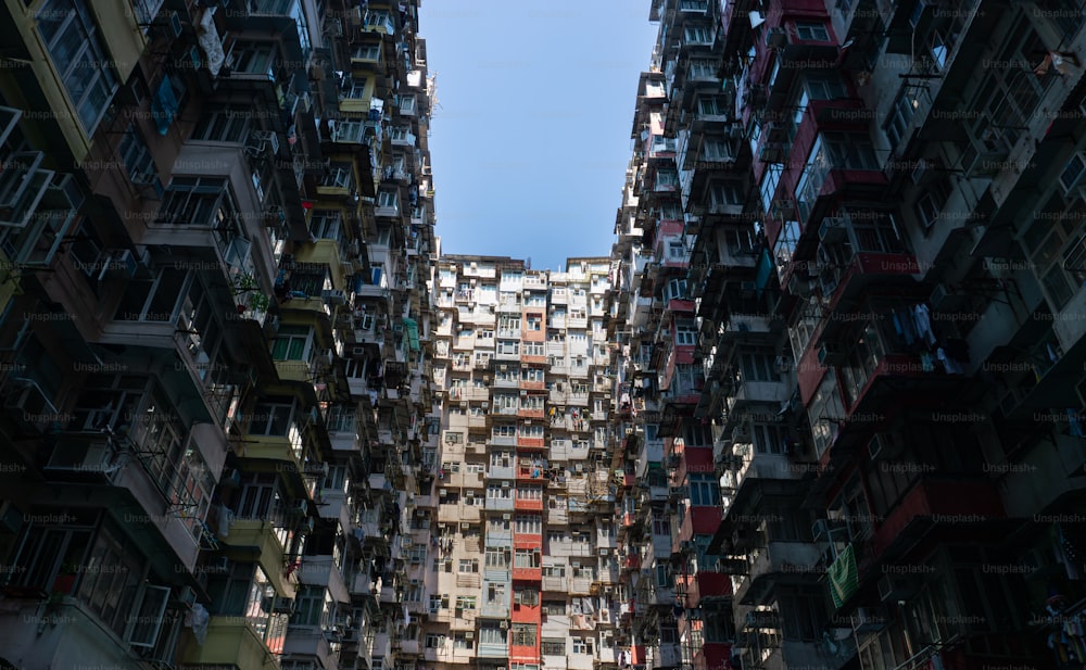 a very tall building with lots of windows and balconies