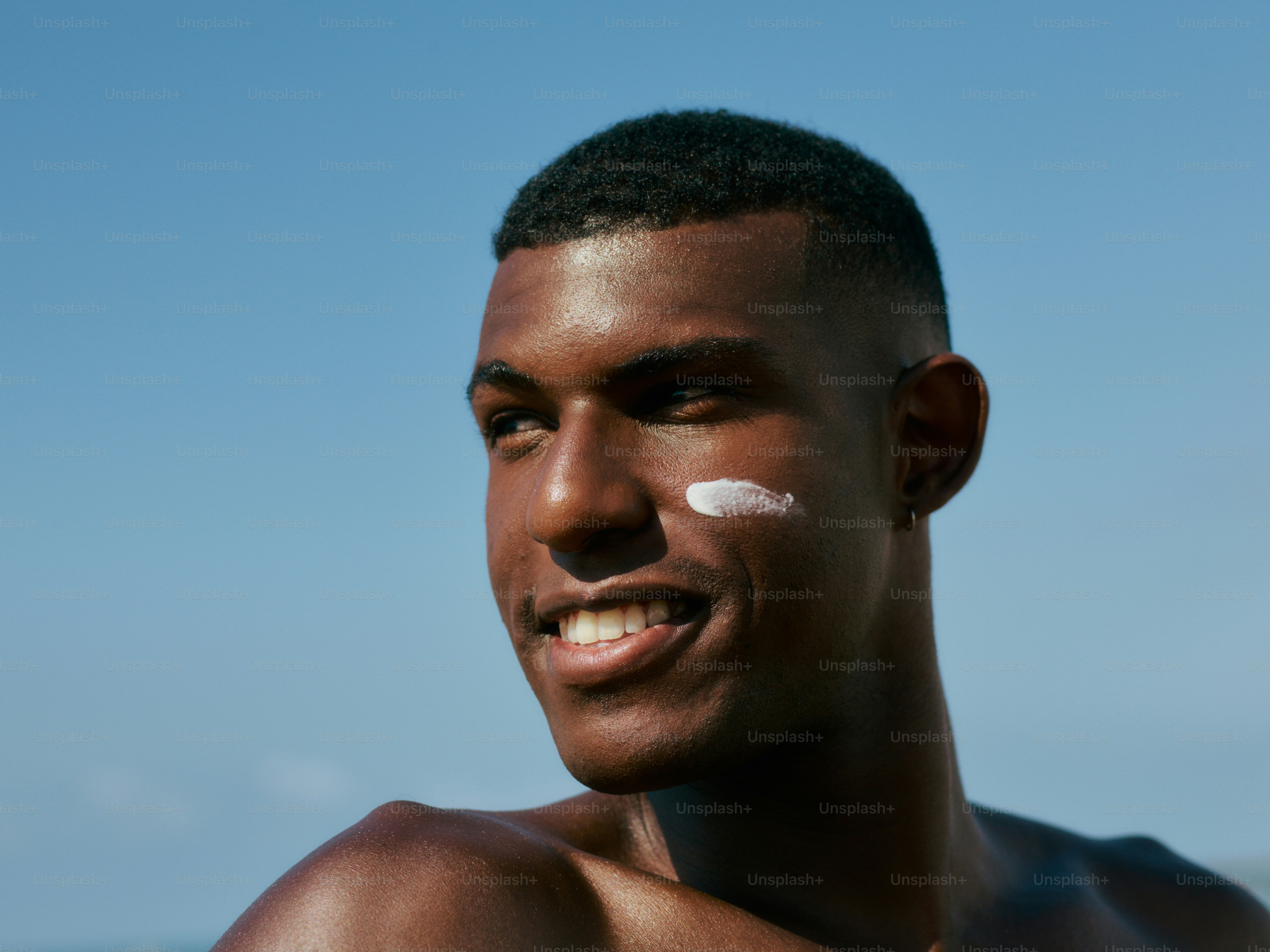 a-man-with-a-white-patch-on-his-face-photo-man-image-on-unsplash