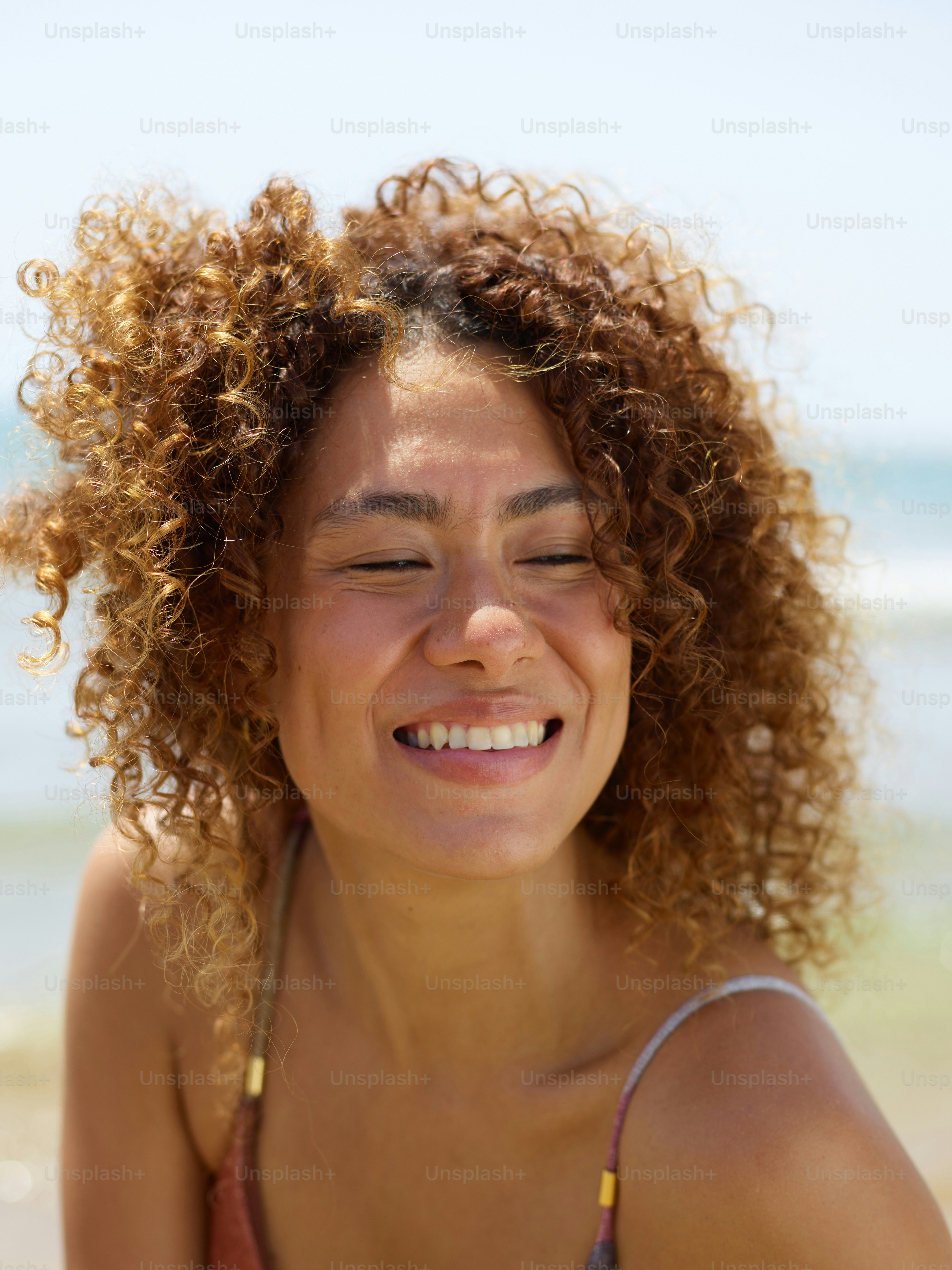 A man without a shirt standing on a beach photo Man Image on Unsplash
