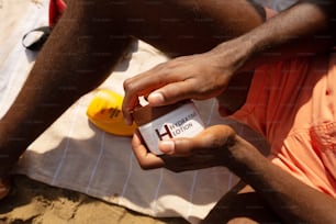 a person holding a small object in their hand