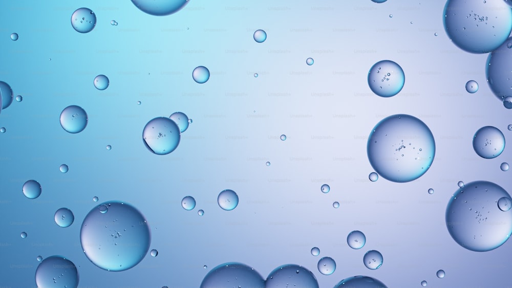 un mucchio di goccioline d'acqua su uno sfondo blu