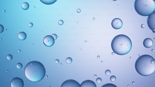 a bunch of water droplets on a blue background