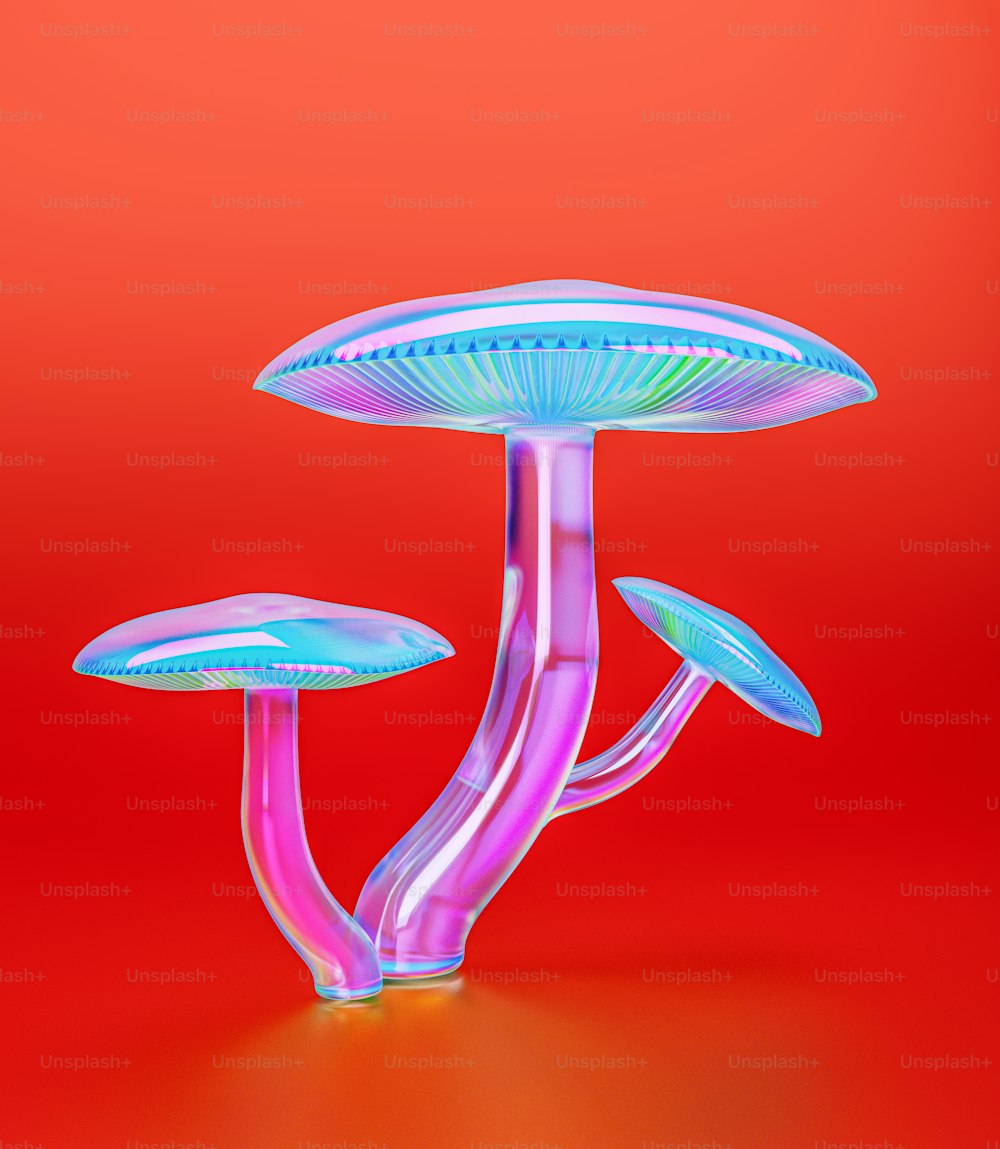 un oggetto a forma di fungo rosa e blu su uno sfondo rosso