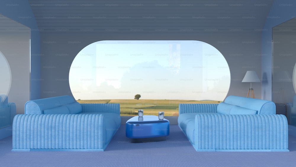 una sala de estar con sofás azules y una ventana redonda