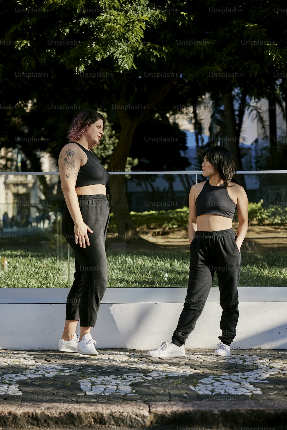 a couple of women standing next to each other