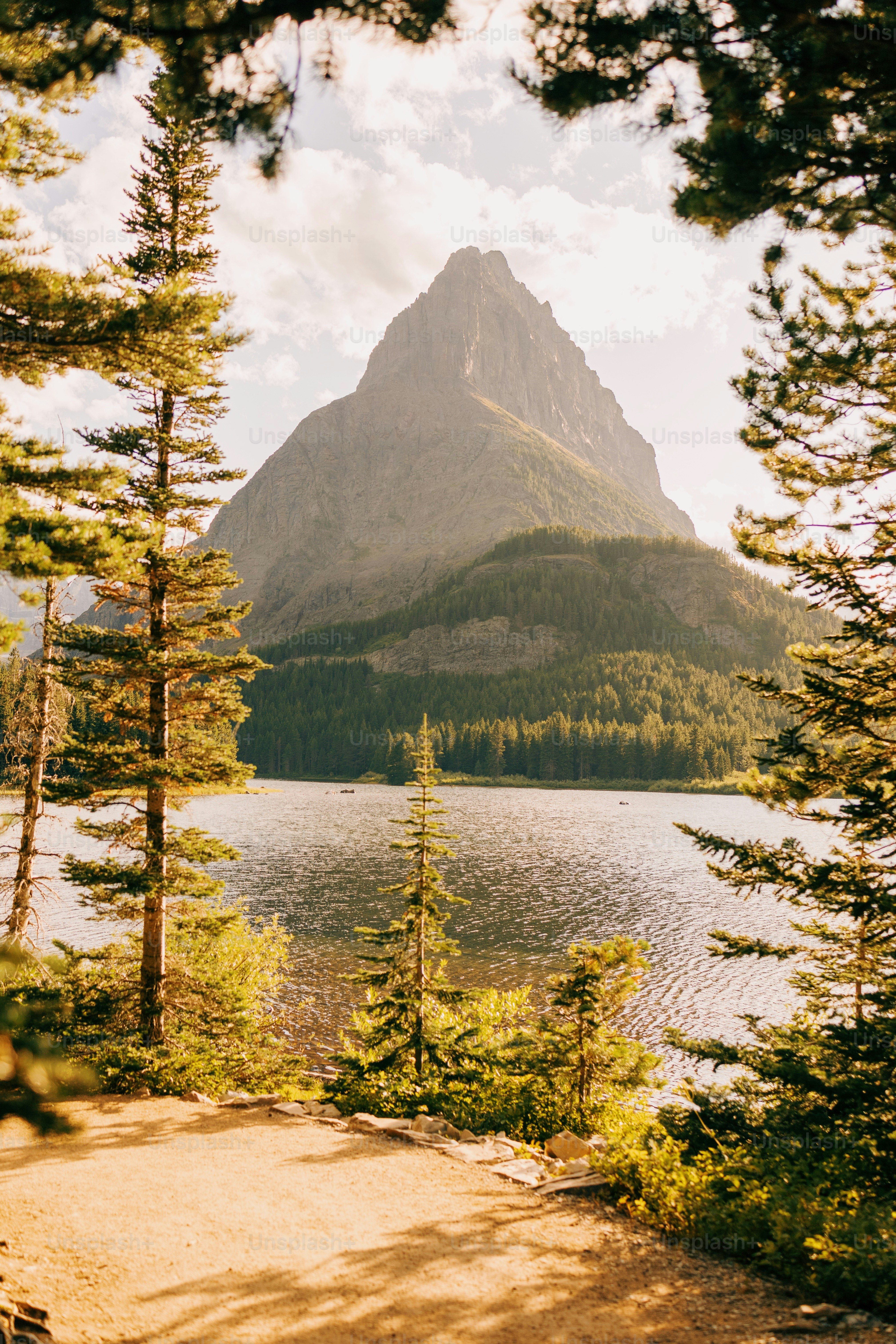a scenic view of a mountain and a lake