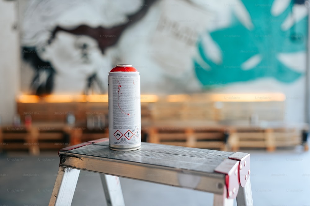 a can of soda sitting on top of a table