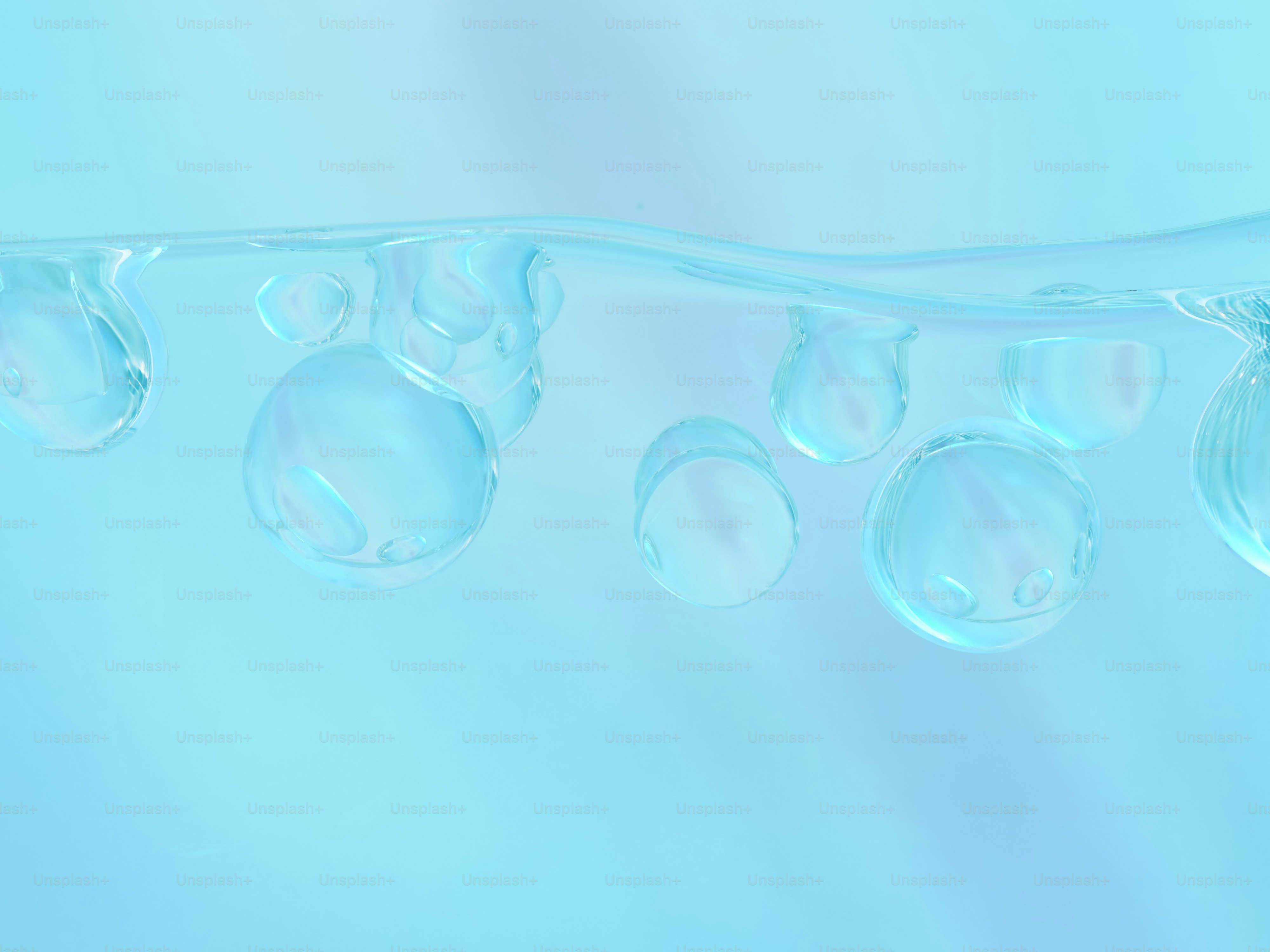 um grupo de bolhas flutuando em cima de uma superfície azul