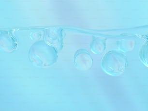 um grupo de bolhas flutuando em cima de uma superfície azul
