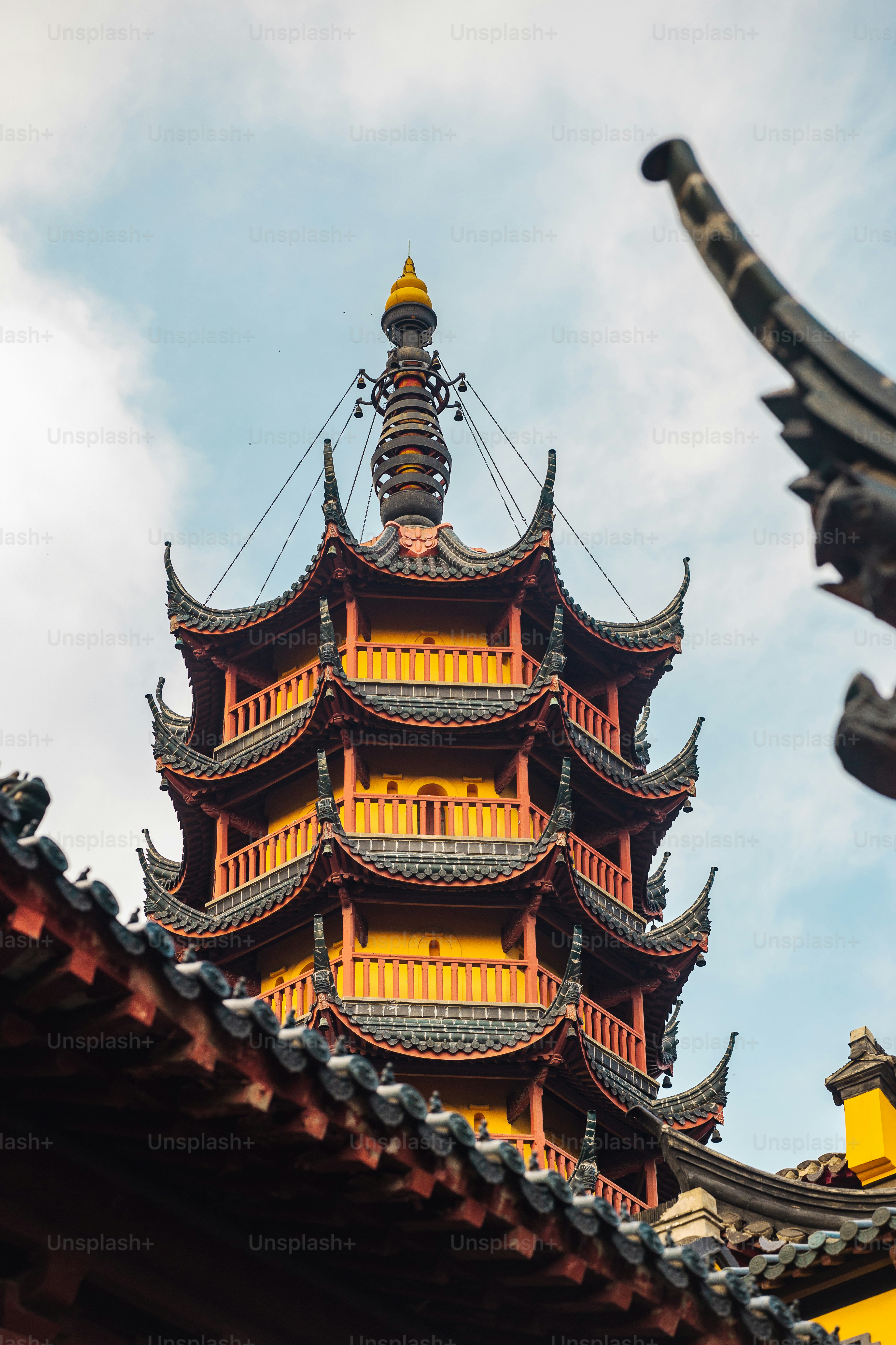 a tall tower with a sky in the background