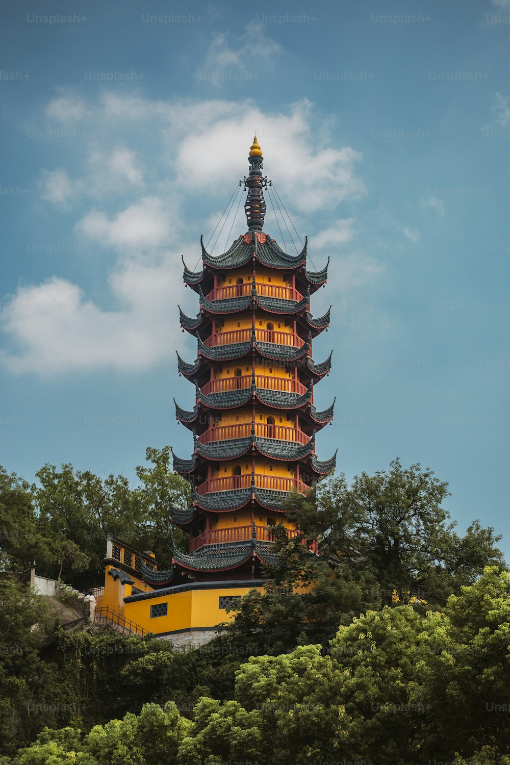 a tall tower with many windows on top of it