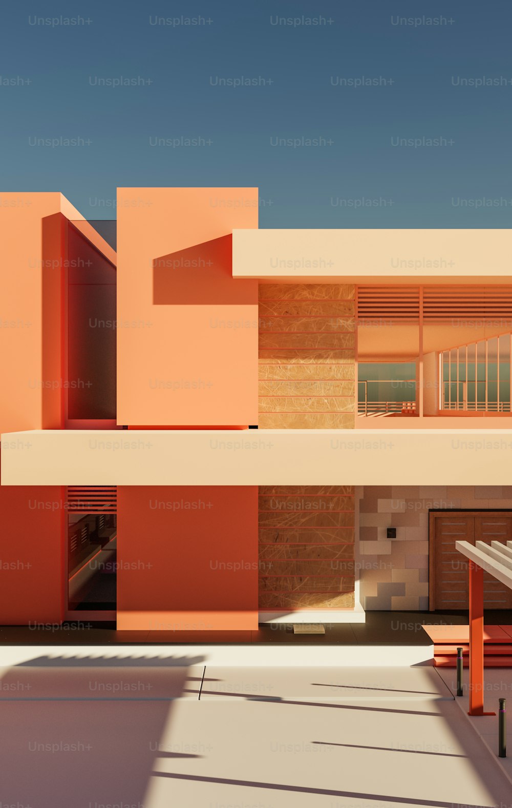 ein orangefarbenes Gebäude mit einer roten Bank davor