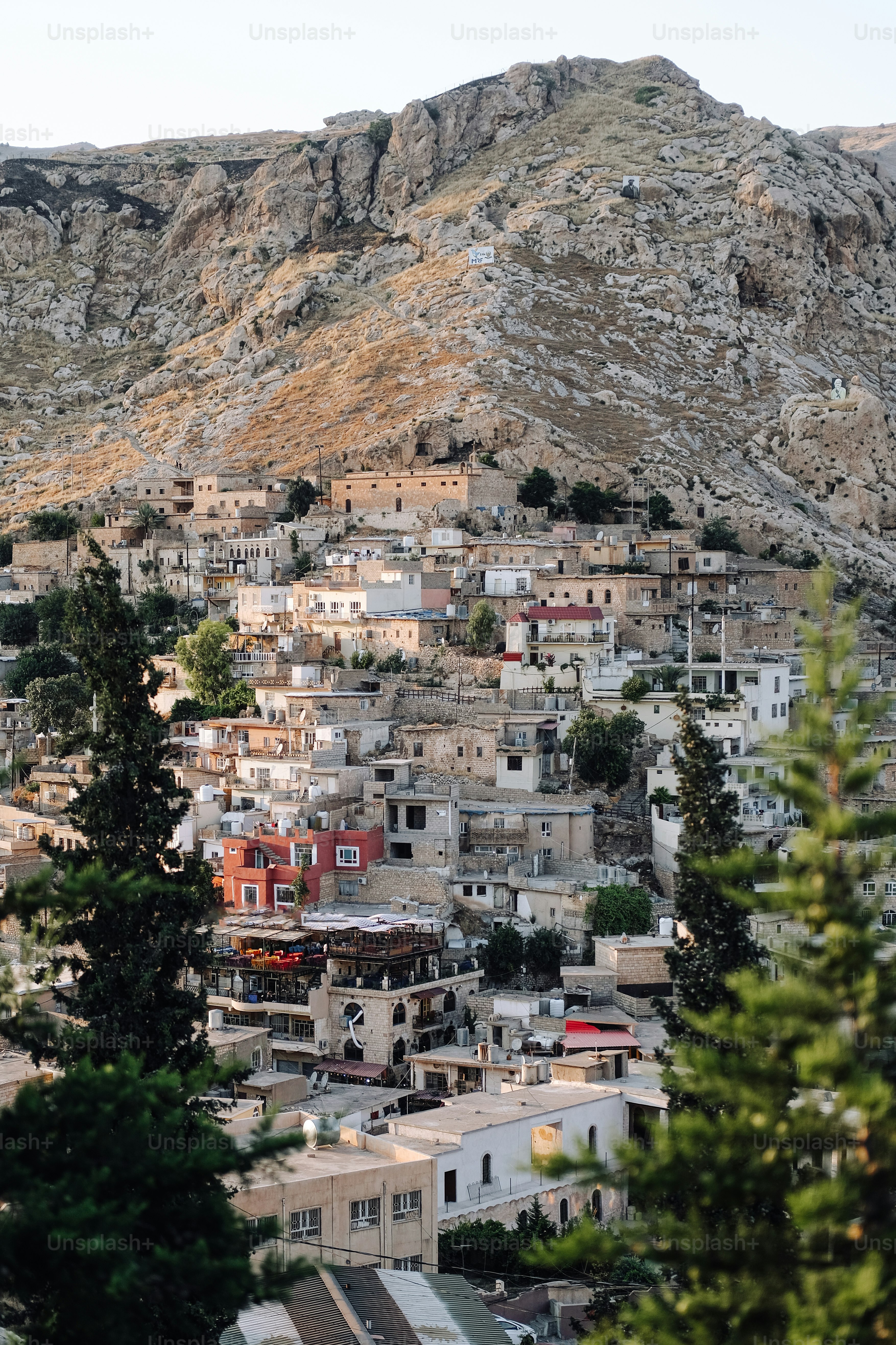 a city with a mountain in the background