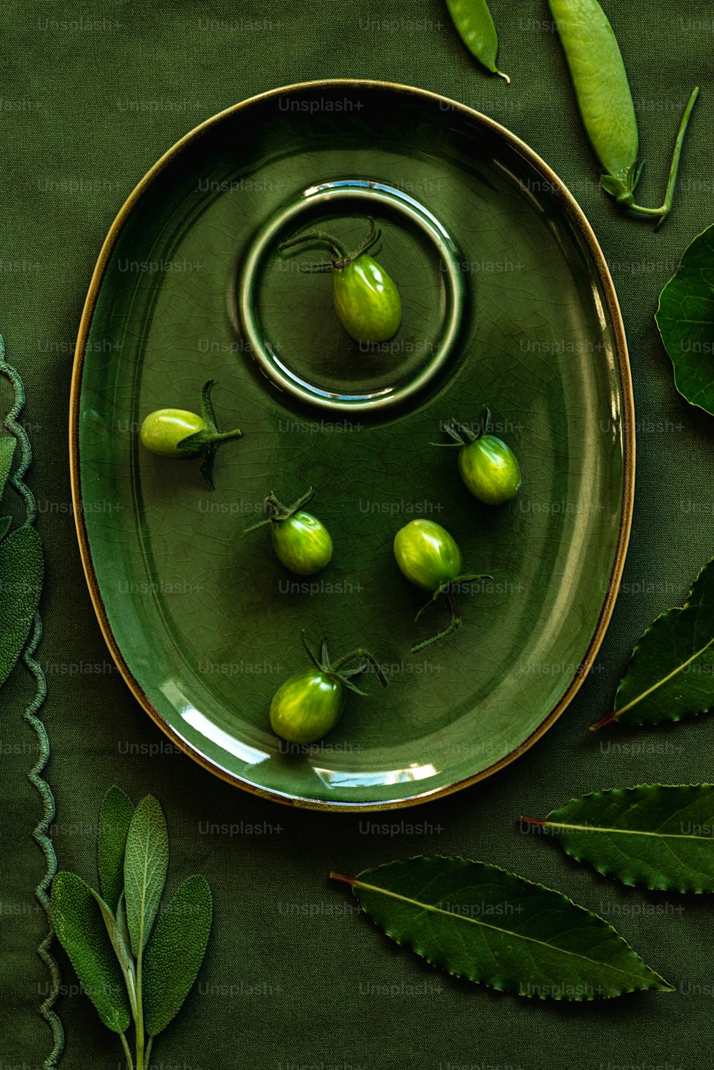 a plate with some green vegetables on it