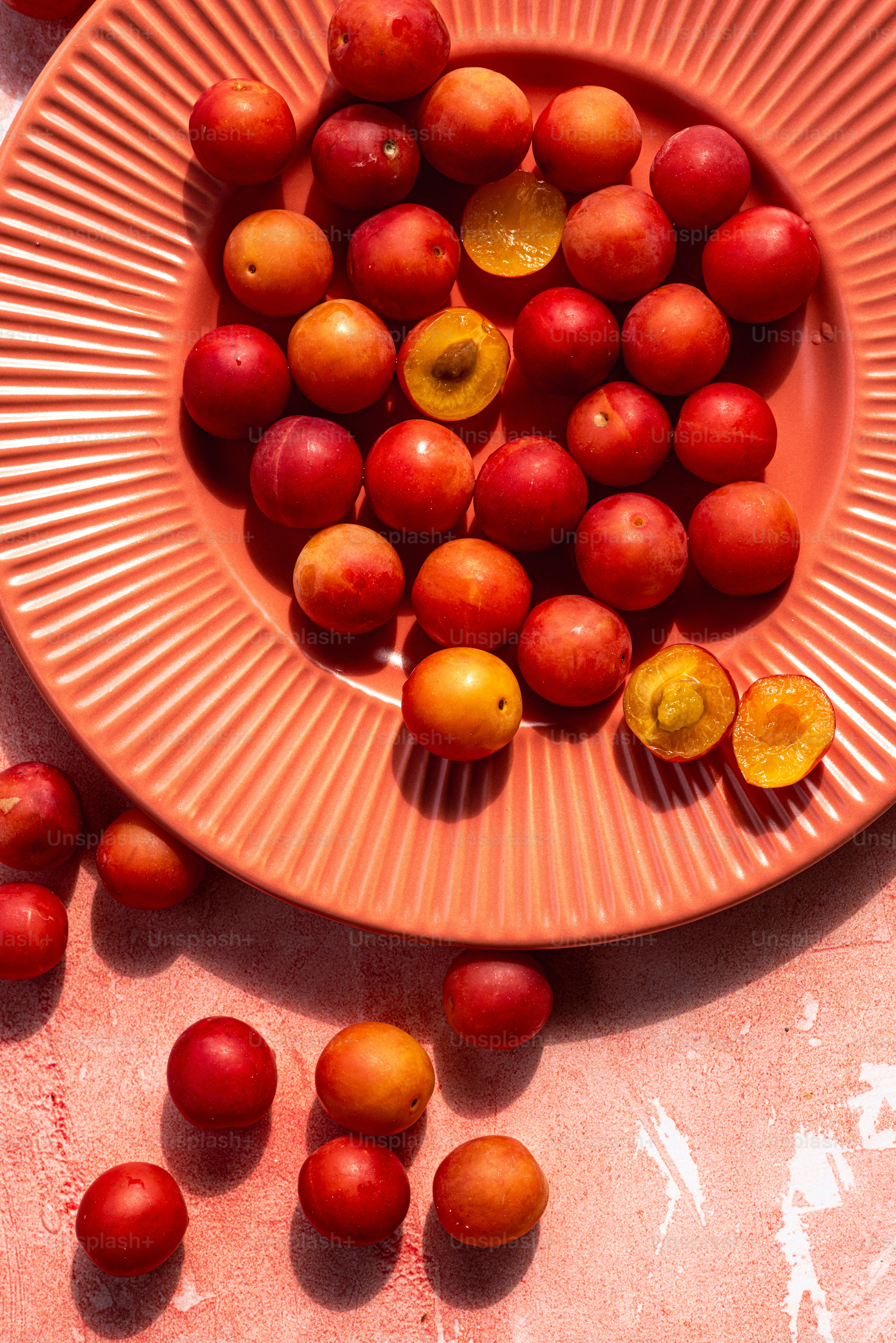 a bowl of fruit is shown on a table