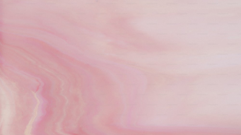 a pink and white marble background