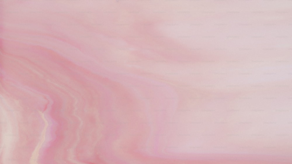 a pink and white marble background