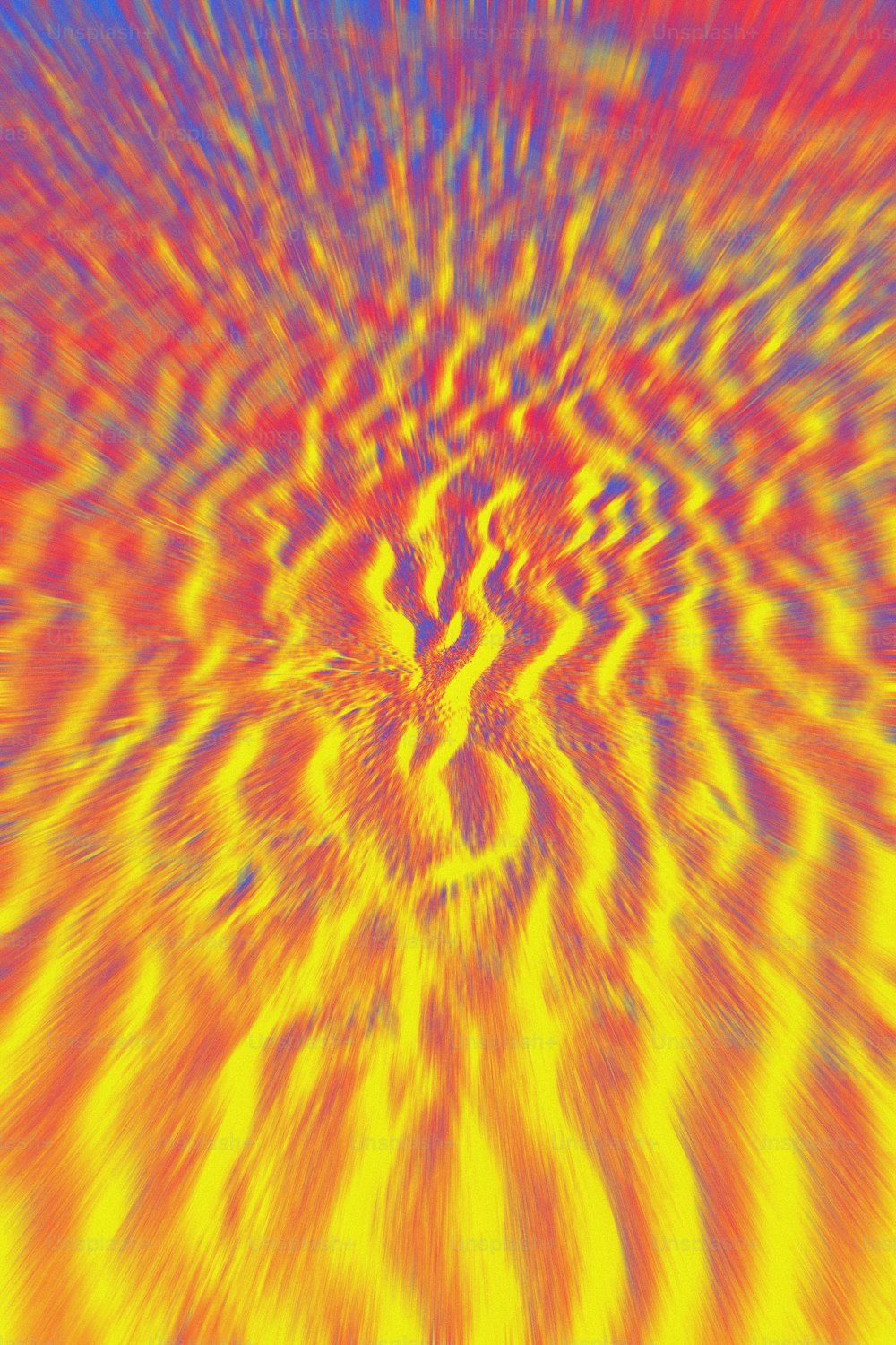 an abstract image of a yellow and red swirl