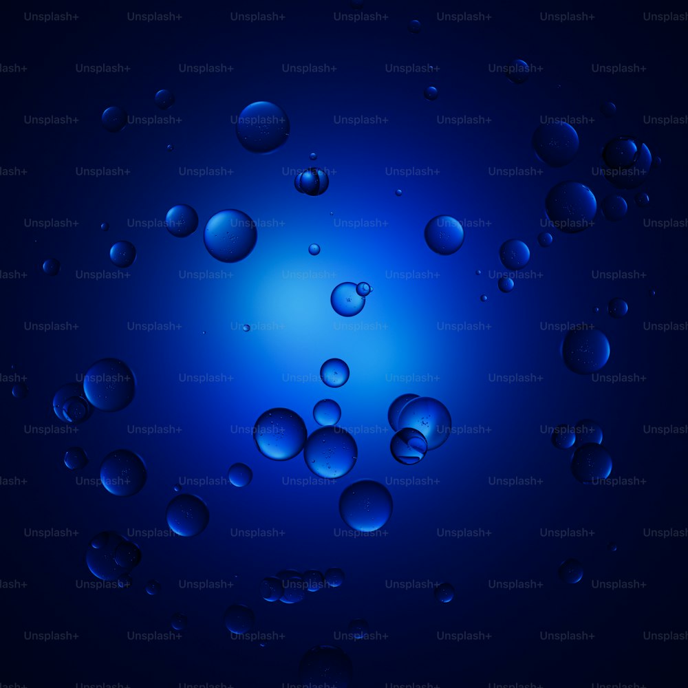 uno sfondo blu con gocce d'acqua su di esso