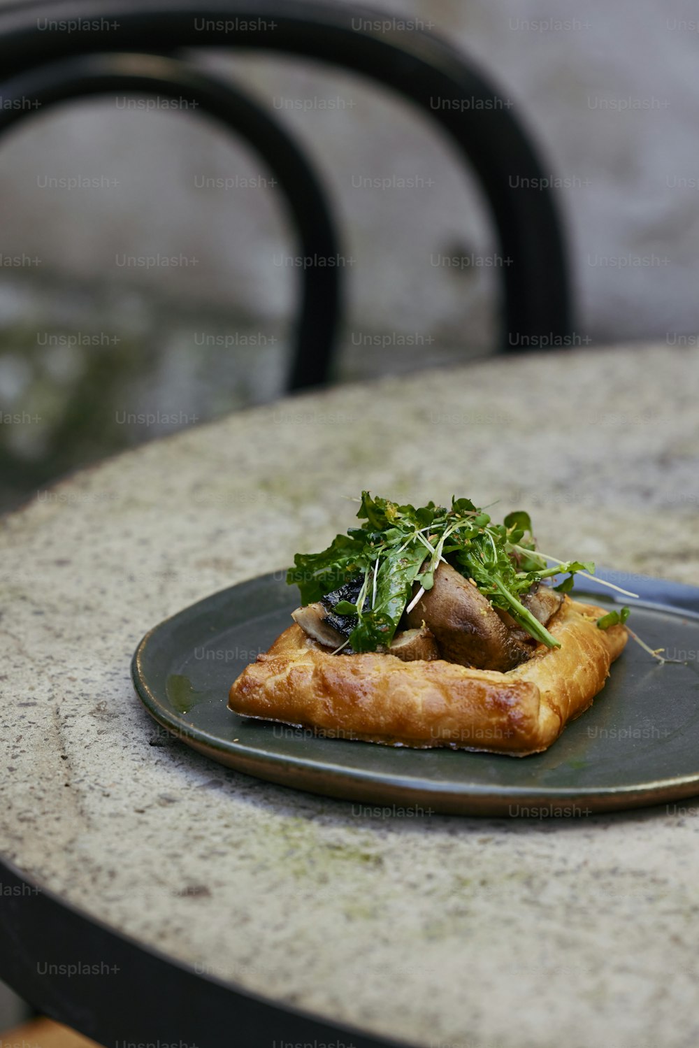 a plate of food sitting on top of a table