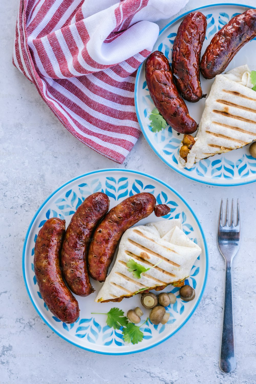 a couple of plates of food on a table