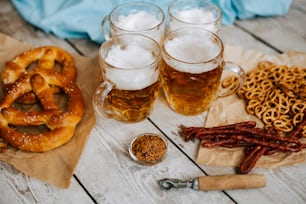 beer, pretzels, and pretzels on a table