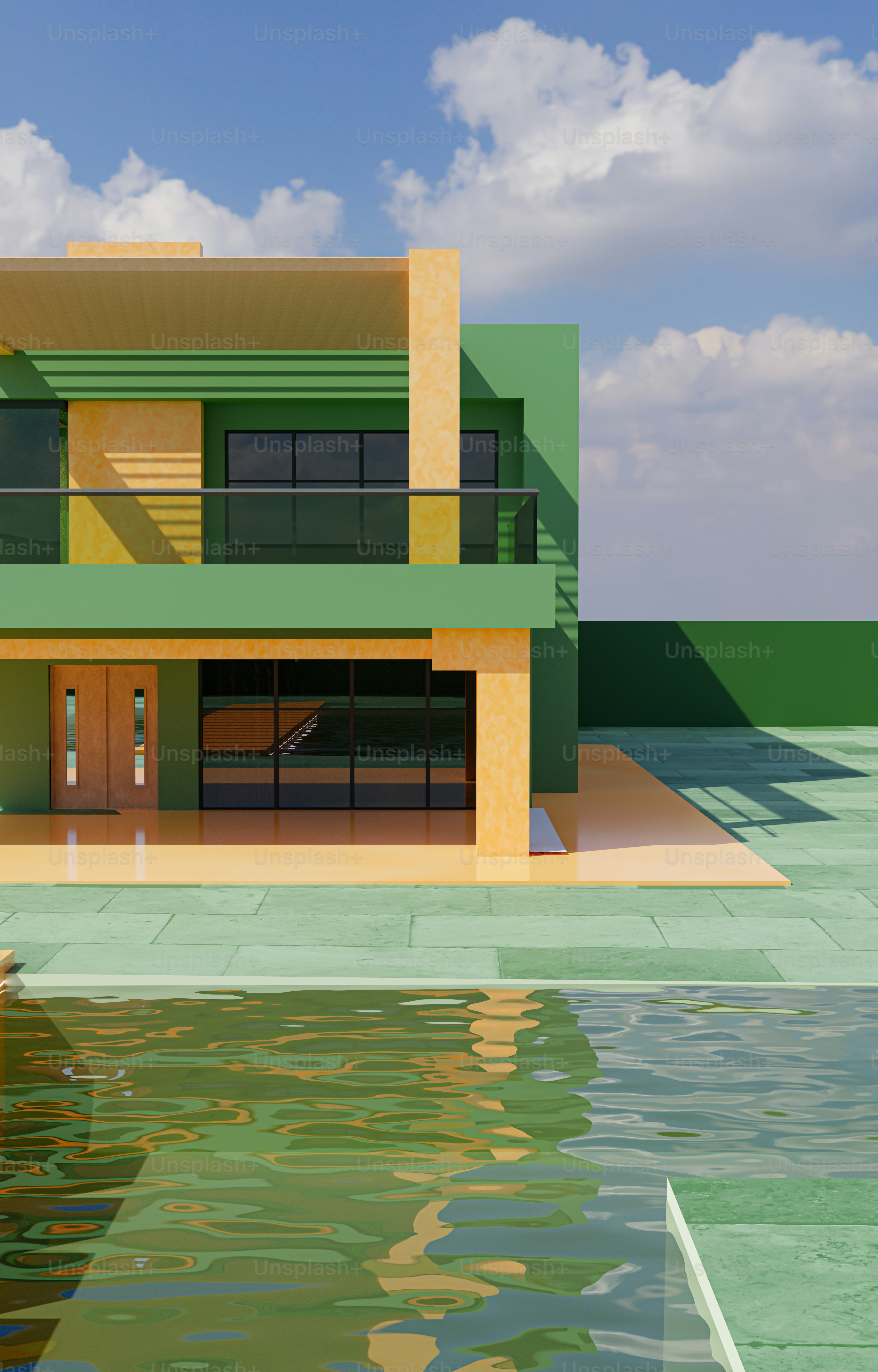 수역 옆에 앉아 있는 녹색과 노란색 집