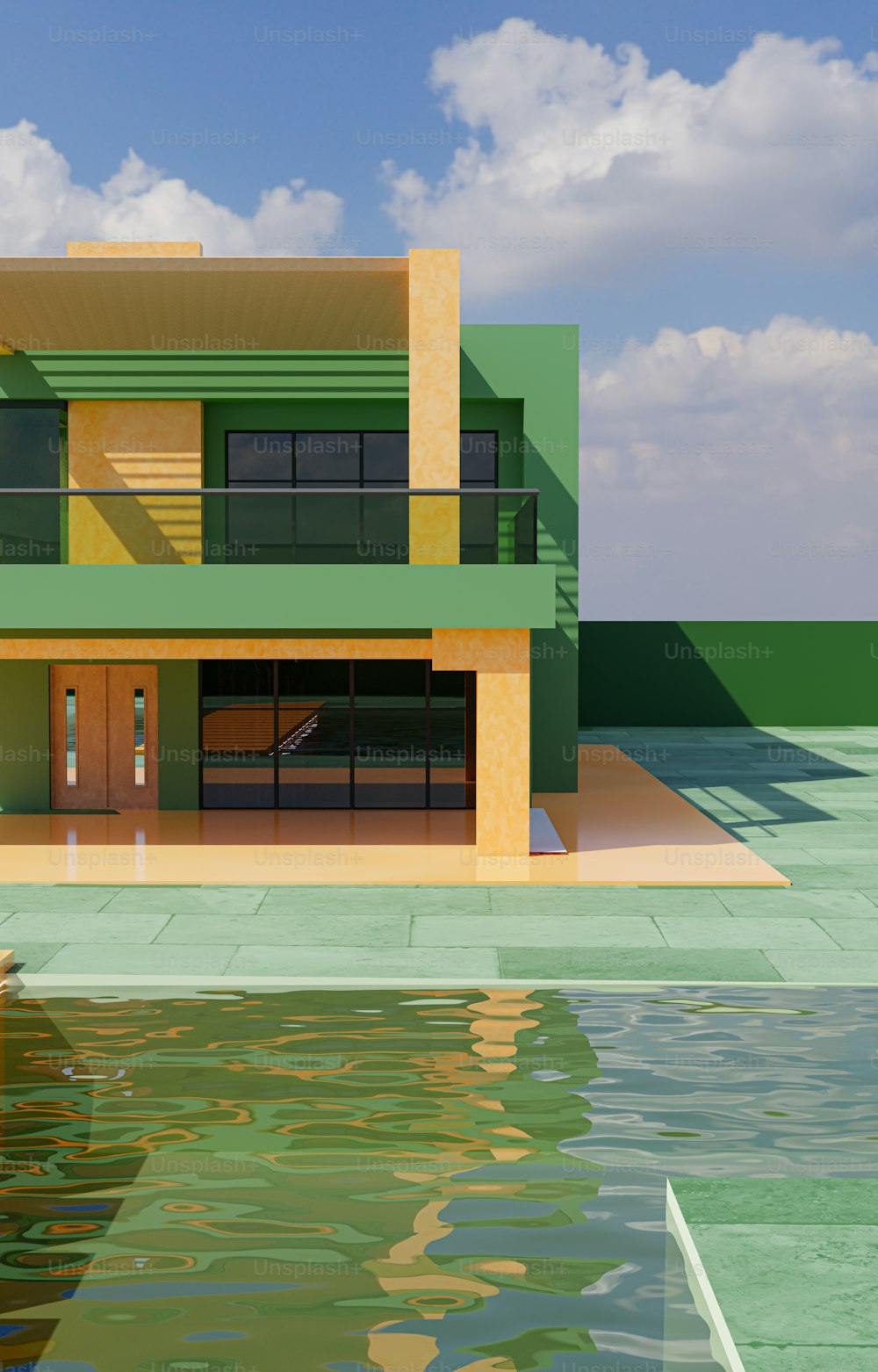 a green and yellow house sitting next to a body of water