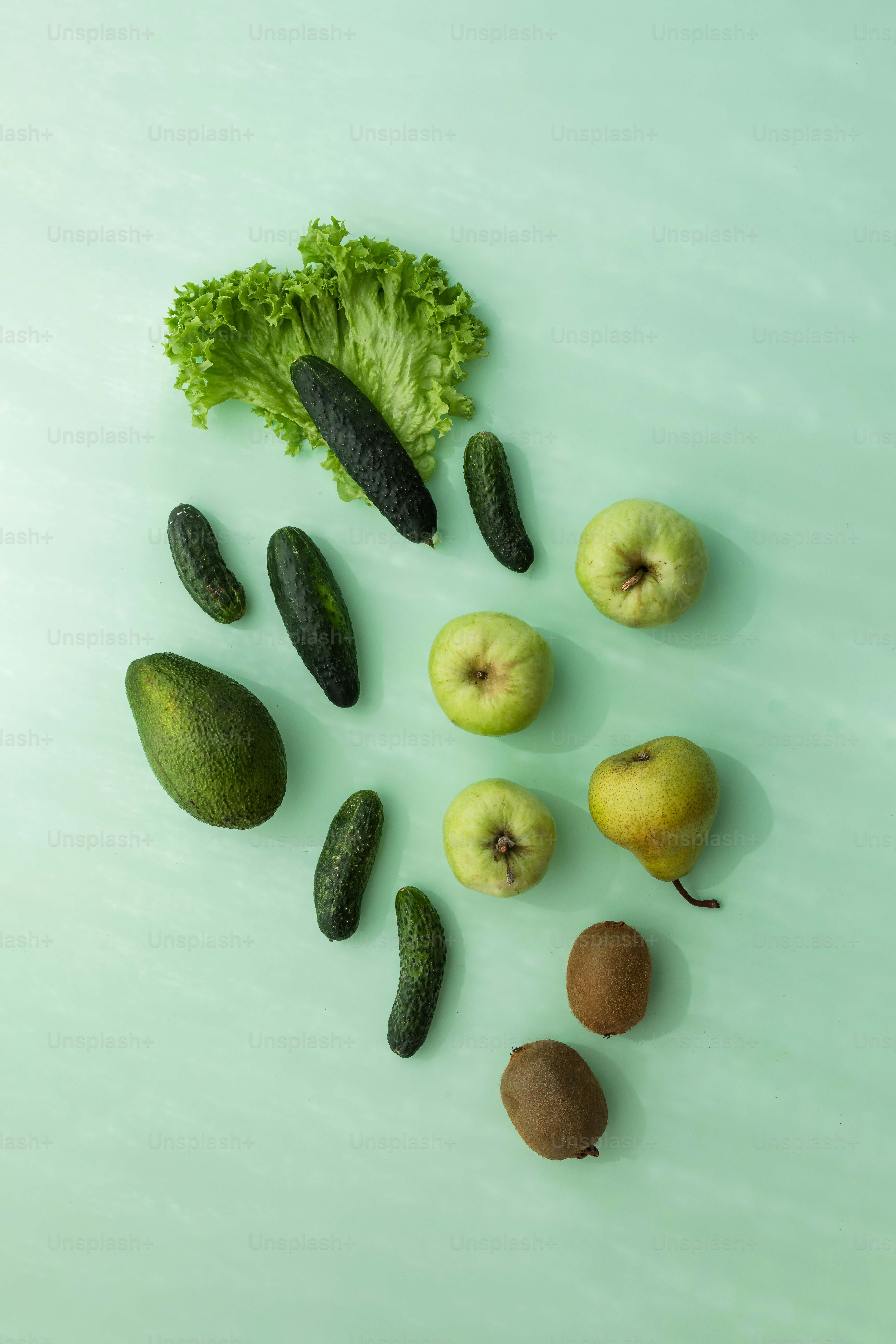 A group of fruits and vegetables sitting on top of a table photo