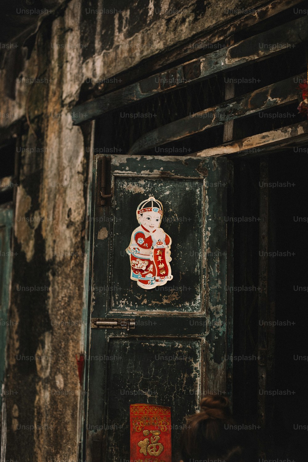 an old door with a sticker on it