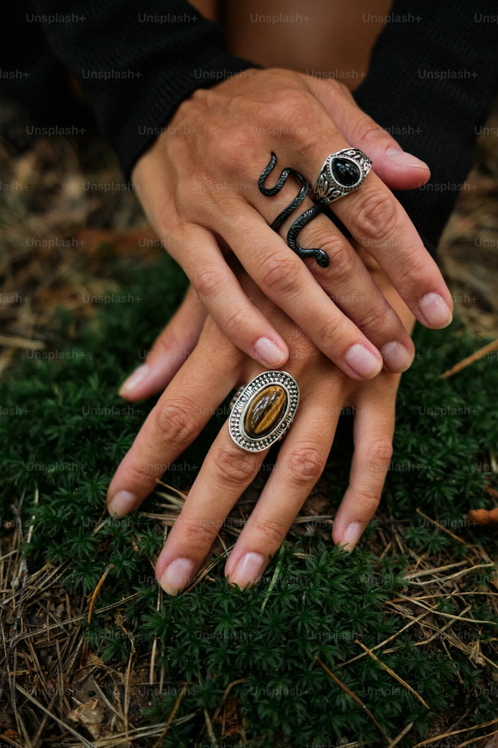 a person with two rings on their hands