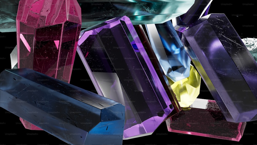 Eine Gruppe verschiedenfarbiger Kristalle auf schwarzem Hintergrund