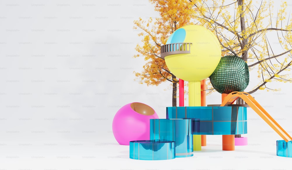 a group of colorful objects sitting next to a tree