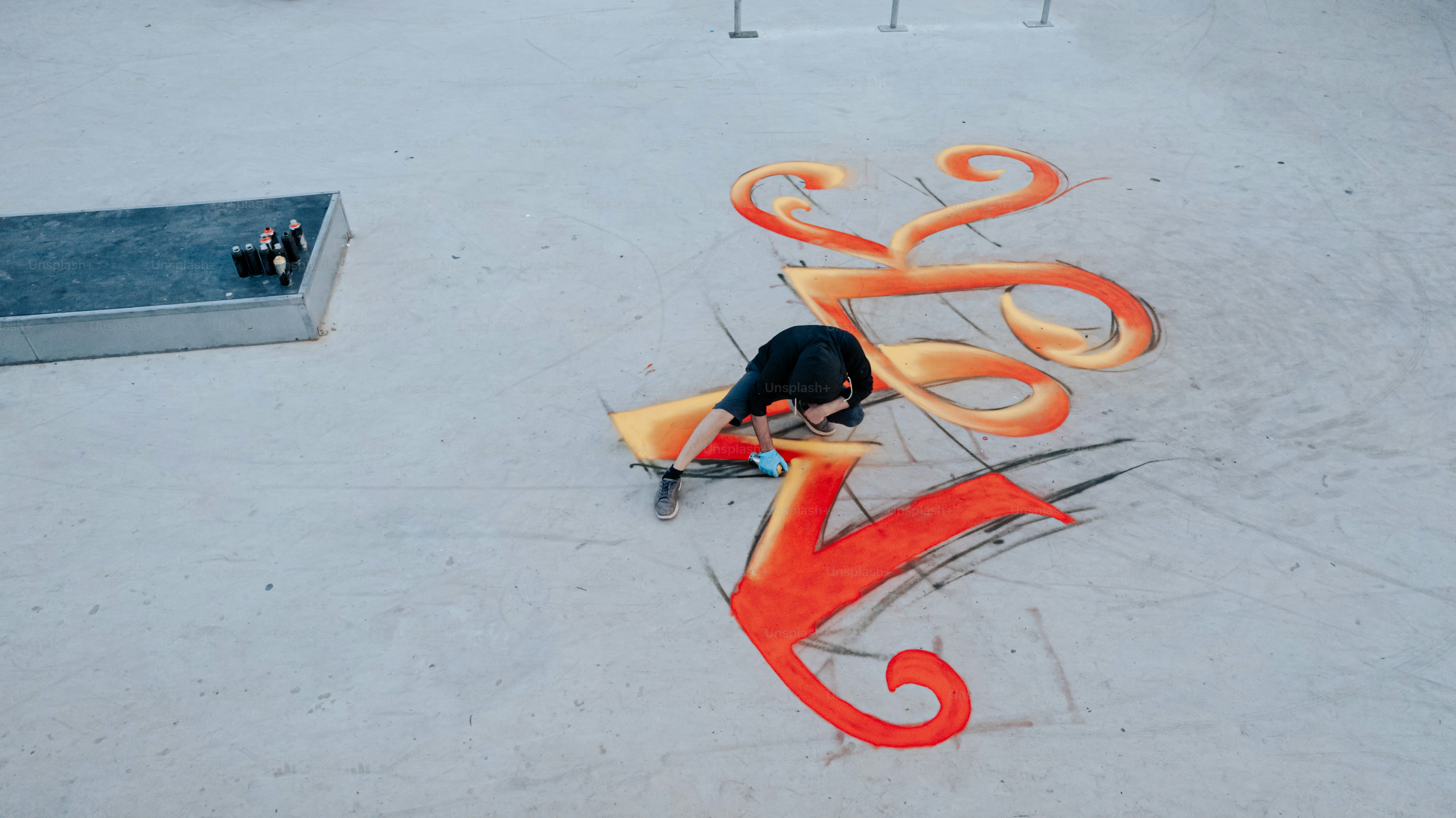 a man riding a skateboard on top of a ramp