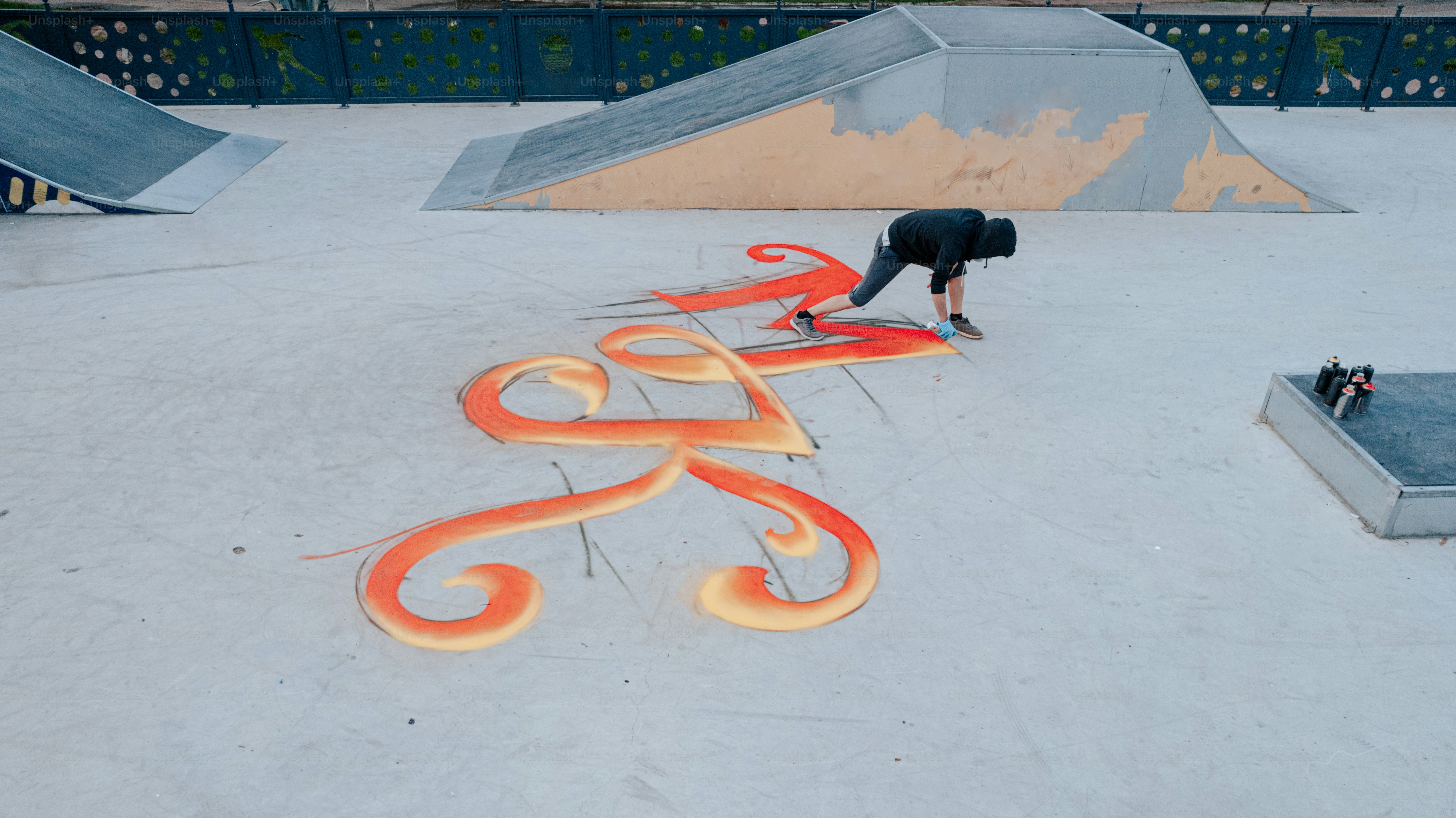 a man on a skateboard in a skate park
