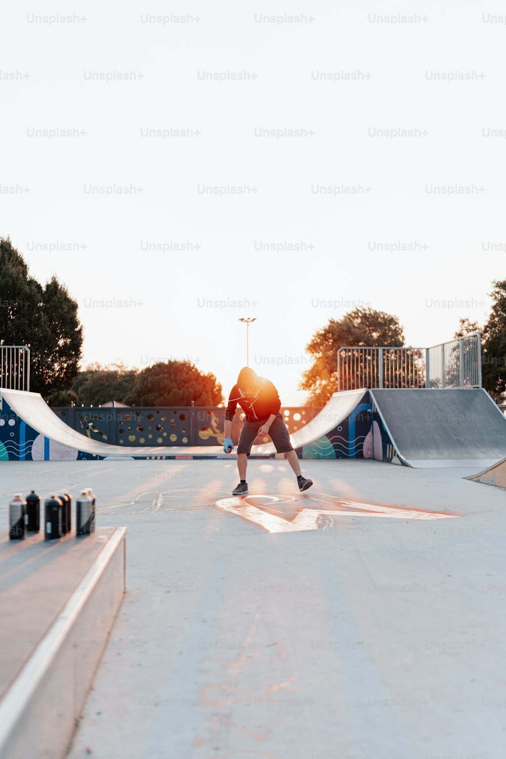 a man riding a skateboard down the side of a ramp