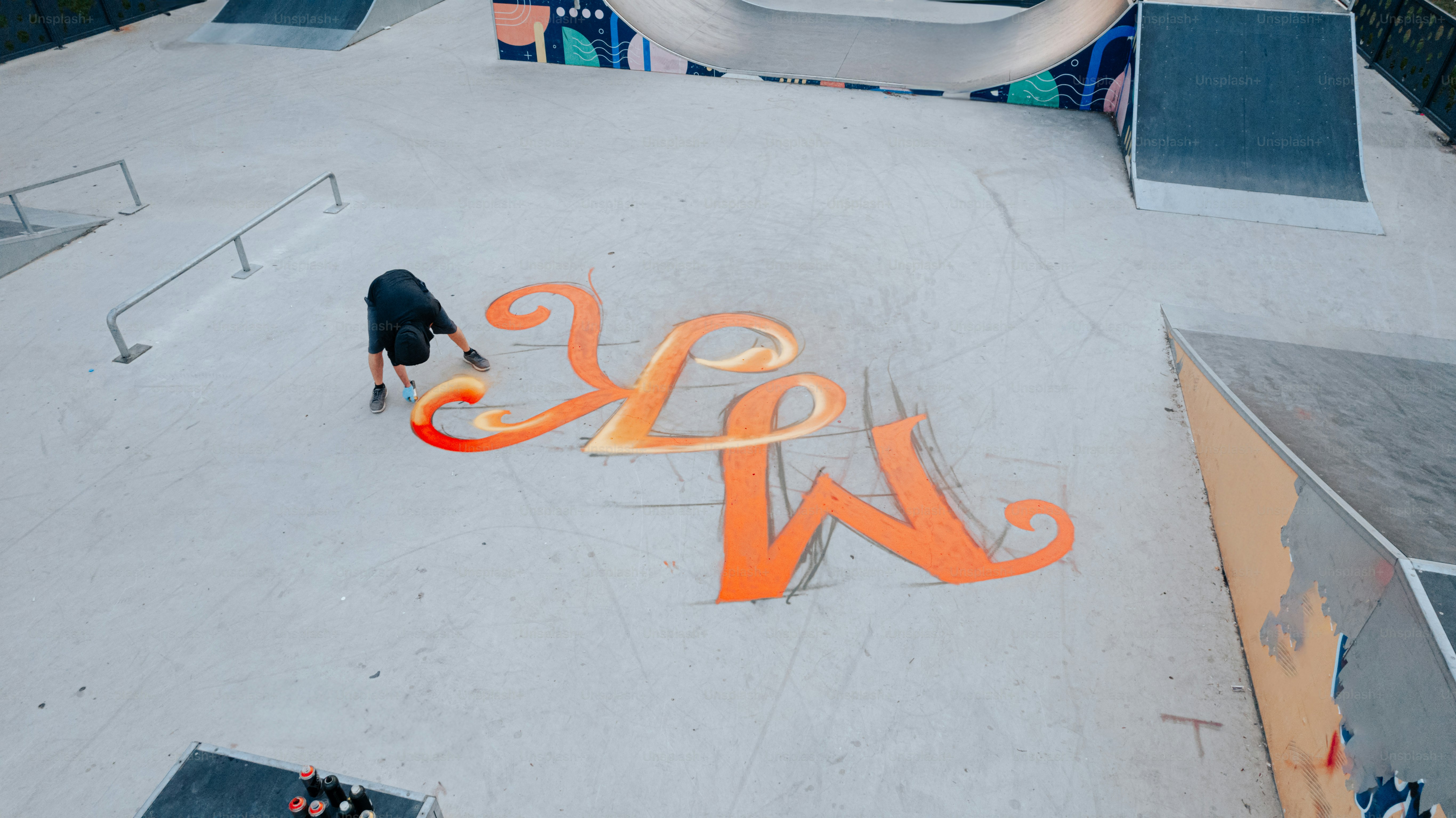 a skateboarder is doing a trick on a ramp