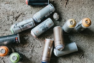 a group of different types of batteries on the ground