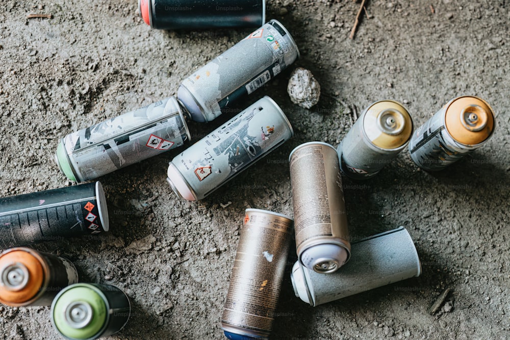 a group of different types of batteries on the ground