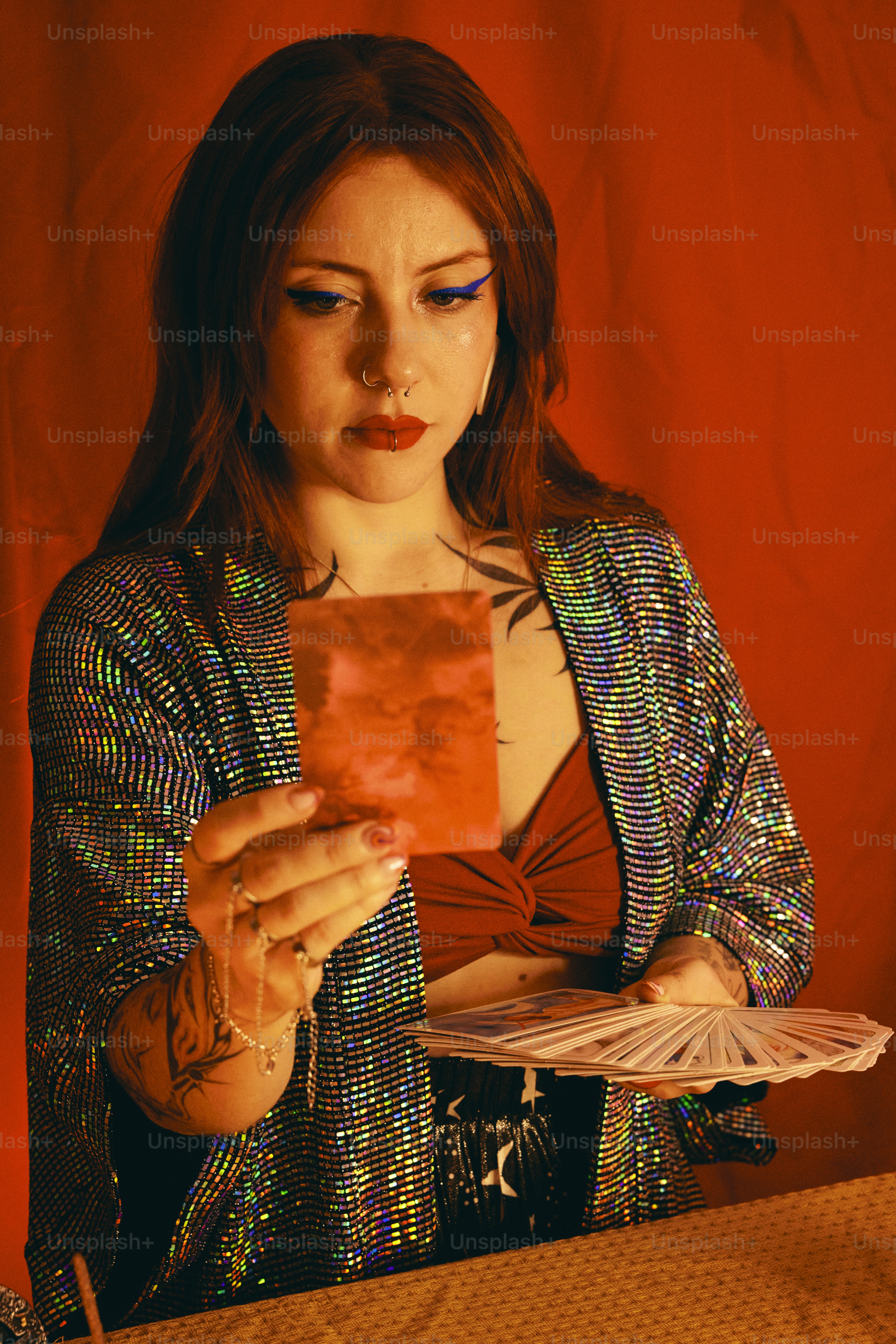 a woman holding a piece of paper in her hands