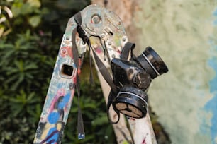 a close up of a pair of scissors and a camera