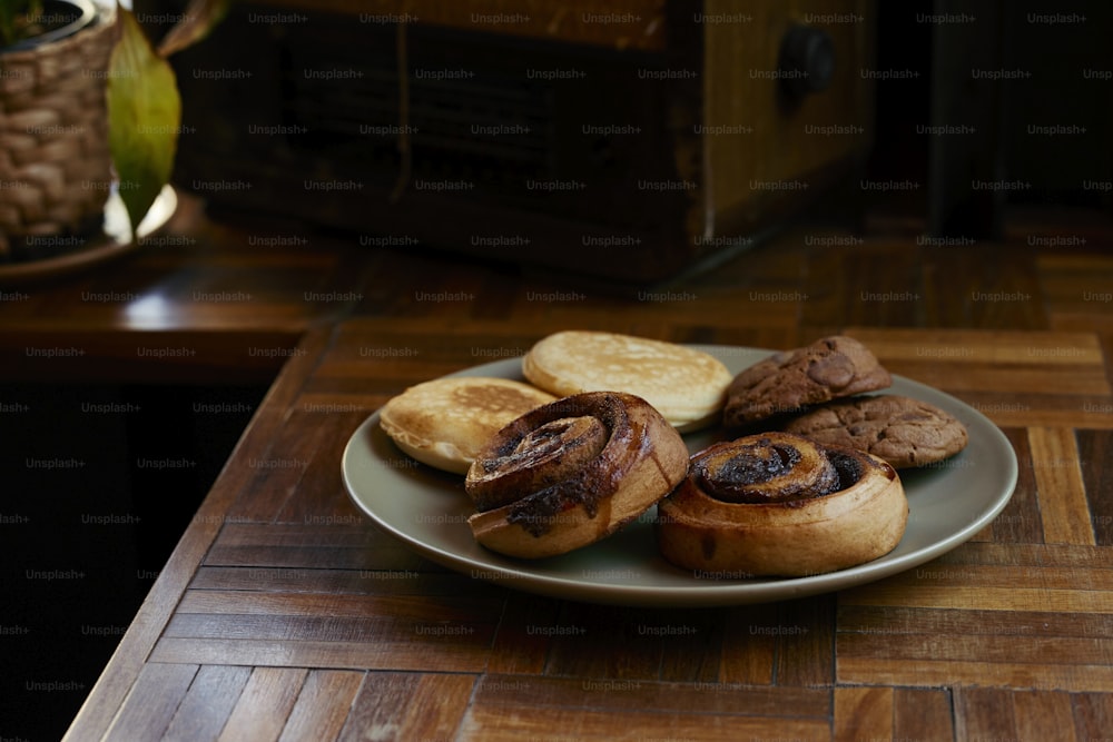 a plate of food on a wooden table