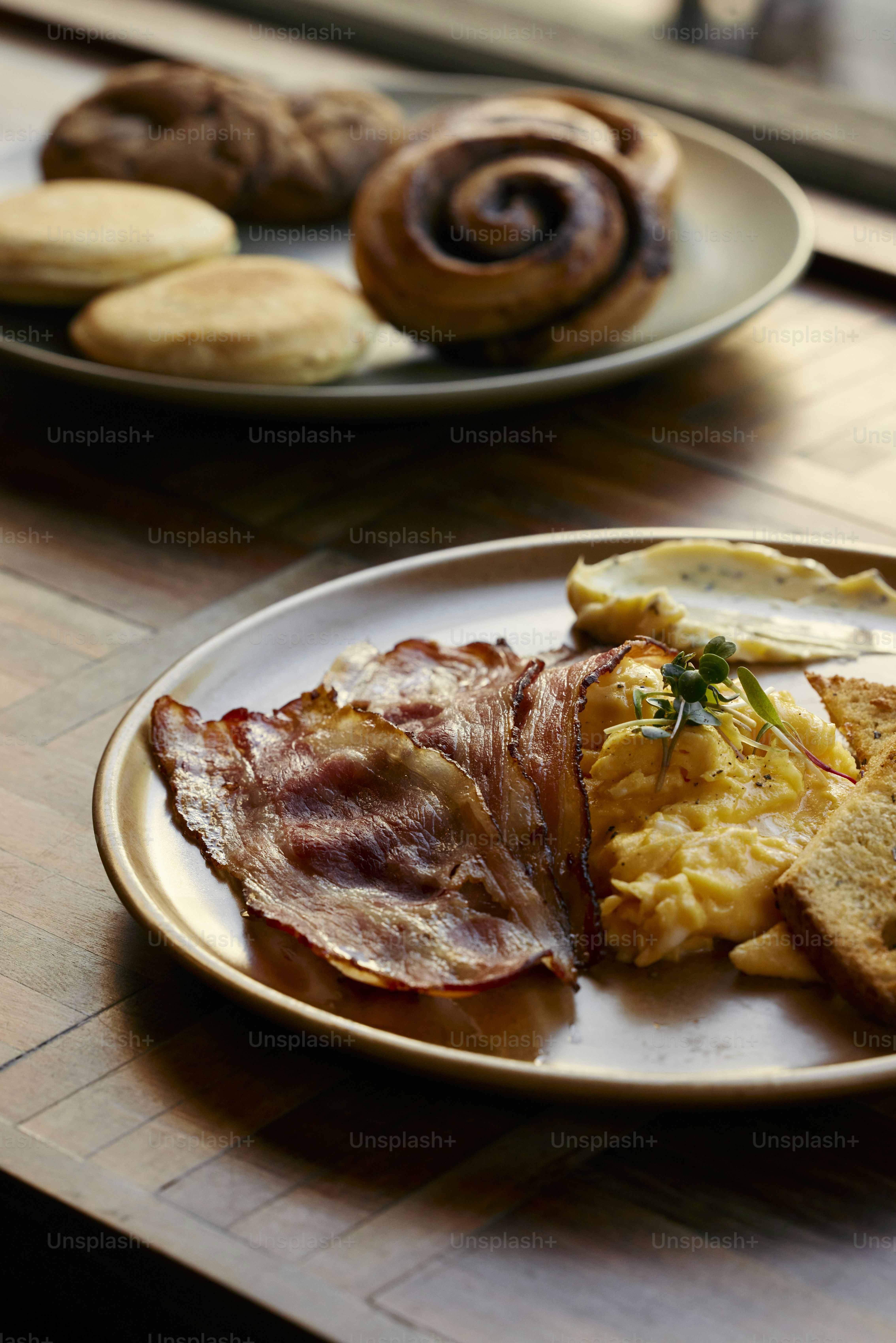 a plate of breakfast food on a table