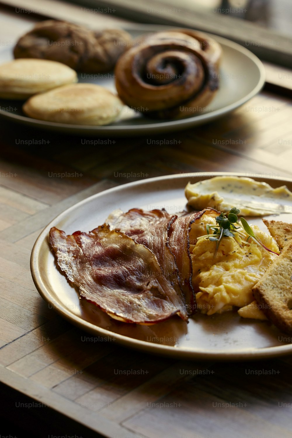 a plate of breakfast food on a table