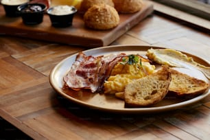 a plate of food on a wooden table